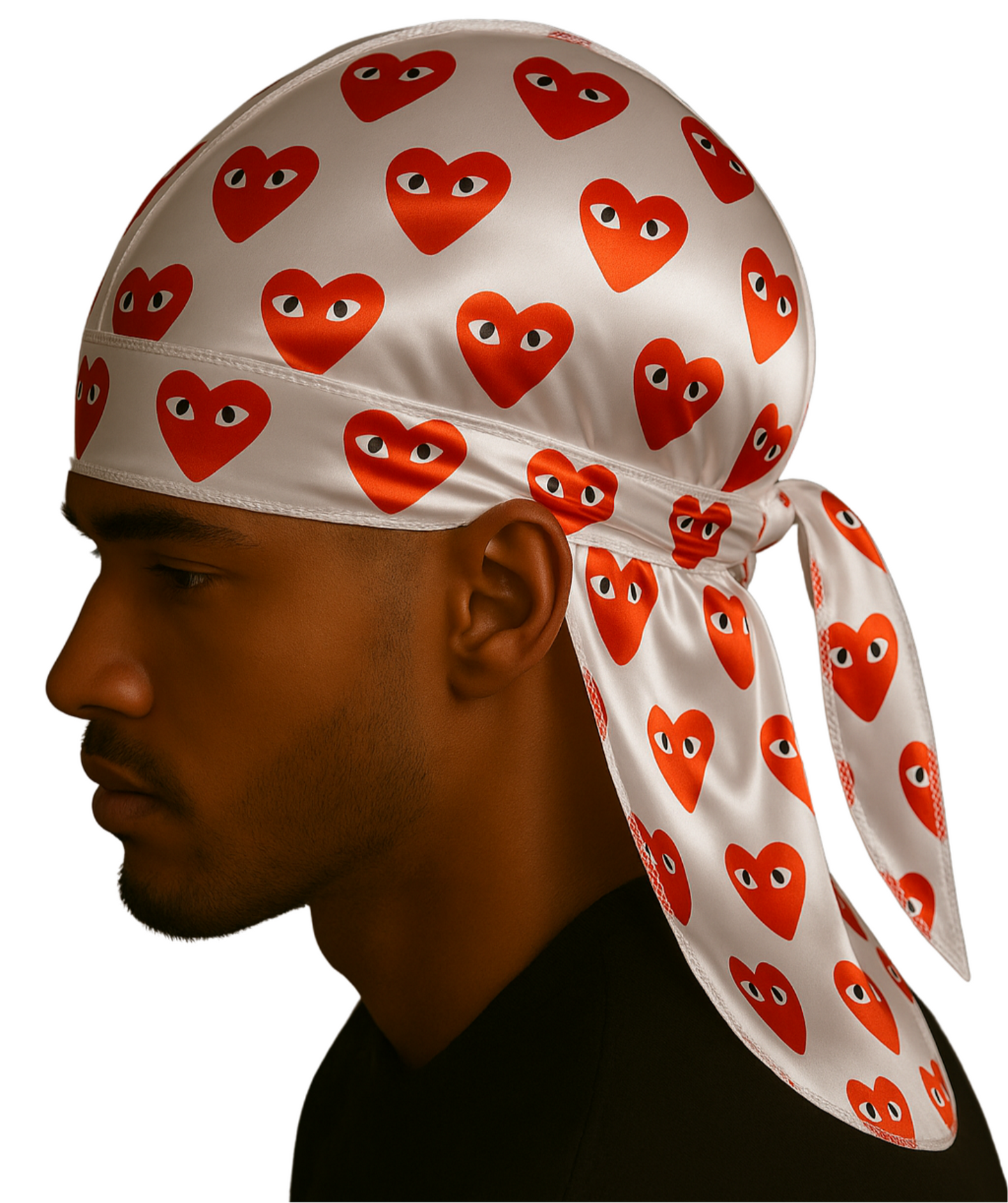 Person wearing a white headscarf with red heart designs on a white background